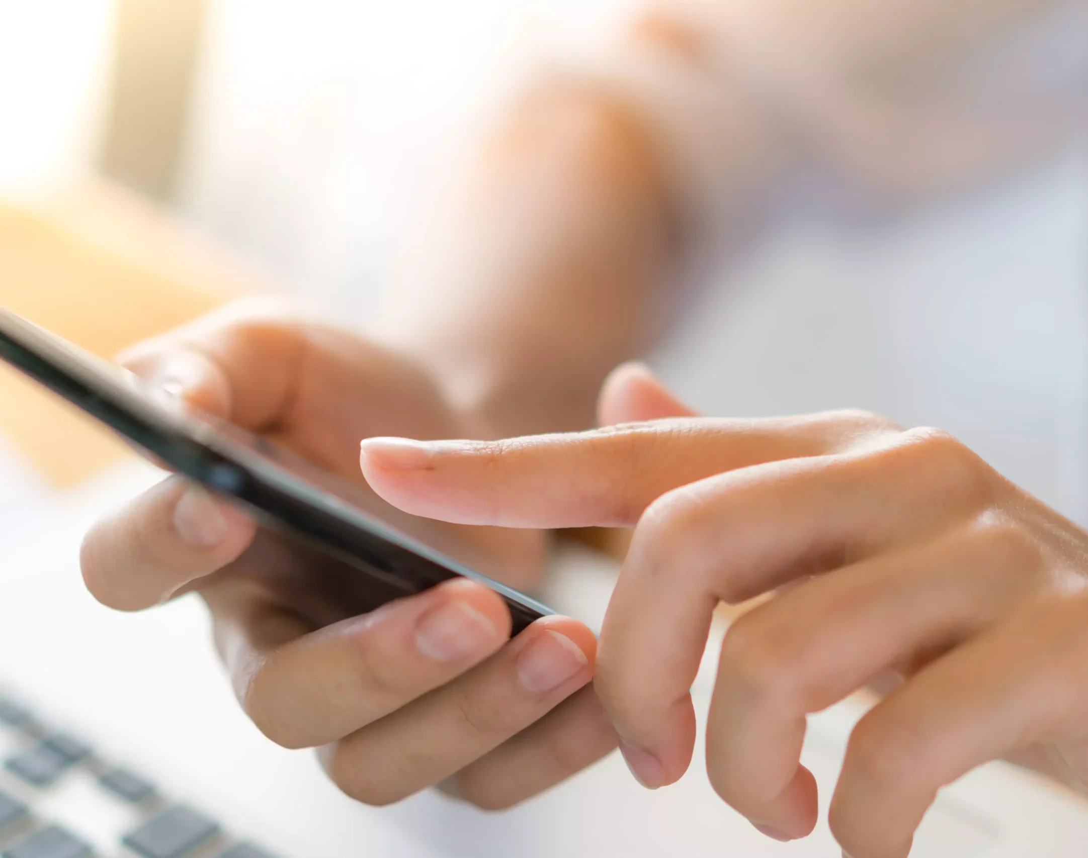 AnyConv.com__business-woman-hand-with-financial-charts-mobile-phone-laptop-table-scaled-e1748958514615.webp